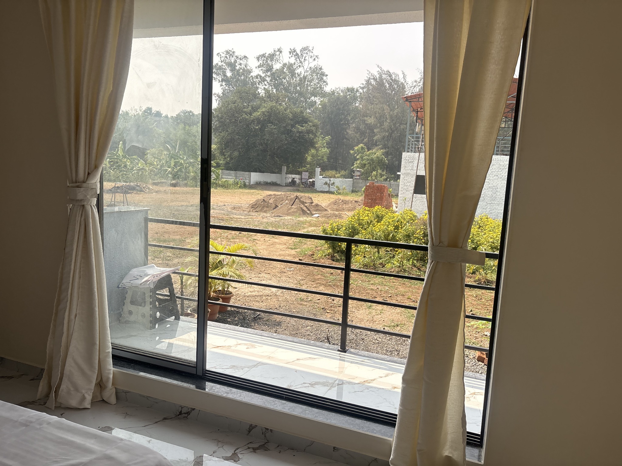 View of the resort grounds from a guest room balcony